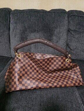 Louis Vuitton Artsy-style hobo handbag